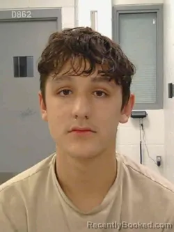 Mugshot of Niccolo Laird Bloom booked in Muscatine County, Iowa on September 21, 2026