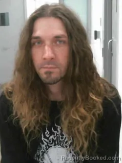 Booking photo from Muscatine County, Iowa