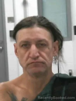 Booking photo from Muscatine County, Iowa