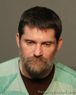 Mugshot of JUSTIN MICHAEL HOLUB booked in Polk County, Iowa on March 18, 2026