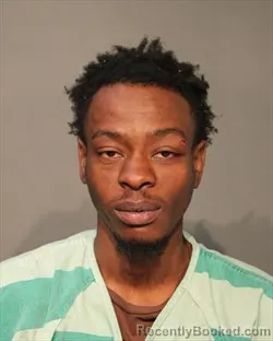 Mugshot of SIMON PIERRE MUHOZA MUGISHA booked in Polk County, Iowa on May 10, 2026