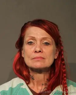 Mugshot of Kimberley Ann Burrows booked in Polk County, Iowa on July 26, 2026