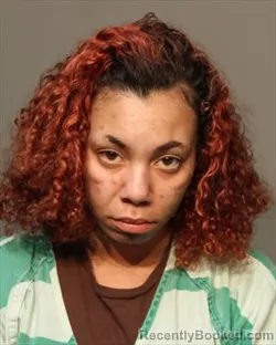 Mugshot of ALEXUS EOTA GREENE booked in Polk County, Iowa on March 13, 2026