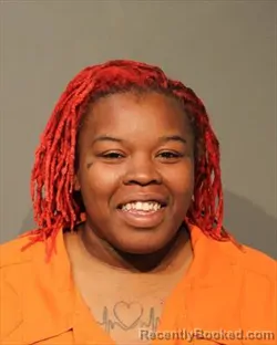 Mugshot of QUEENISHA TOOTSIE BROWN booked in Polk County, Iowa on April 20, 2026