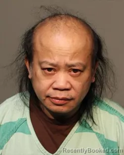 Mugshot of DENG LEM VAN booked in Polk County, Iowa on May 26, 2026