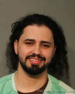 Mugshot of IMAD EDDINE AMENZOU booked in Polk County, Iowa on June 20, 2026