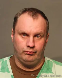 Mugshot of CHRISTOPHER BLAKE GRUNDER booked in Polk County, Iowa on March 13, 2026