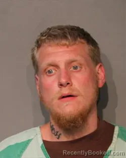 Mugshot of RYAN MICHAEL BURROWS booked in Polk County, Iowa on July 1, 2026