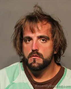 Mugshot of JUSTIN MICHAEL CUEVAS