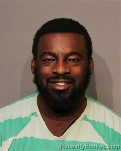Mugshot of KEVIN A ADEREMI
