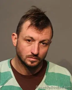 Mugshot of ZACHARY JAMES DOWLING booked in Polk County, Iowa on March 9, 2026