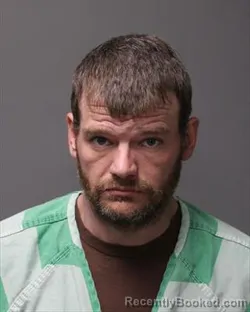 Mugshot of GENE ALAN JR HENNICK booked in Polk County, Iowa on March 10, 2026