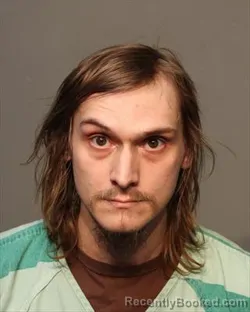 Mugshot of OLIVER NOAH RUTHERFORD booked in Polk County, Iowa on March 11, 2026