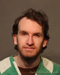 Mugshot of SCOTT ALEXANDER KOSLOW booked in Polk County, Iowa on March 13, 2026