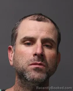 Mugshot of JUSTIN PATRICK ANGEL URIBE booked in Polk County, Iowa on March 14, 2026