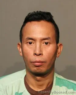 Mugshot of PENG HNIN booked in Polk County, Iowa on March 14, 2026