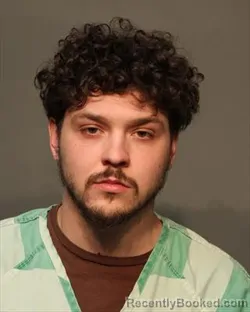 Mugshot of BLADE MICHAEL CHENET booked in Polk County, Iowa on March 18, 2026