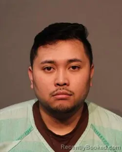 Mugshot of SAVANHPHONE CALVIN THEPPANYA booked in Polk County, Iowa on March 18, 2026