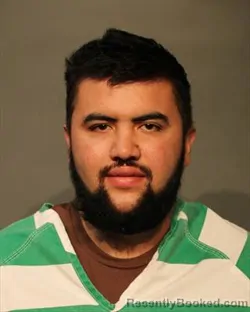 Mugshot of ORTIKDZHON ESHMIRZOEV