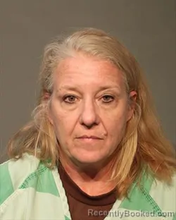 Mugshot of KERI DEE FALL booked in Polk County, Iowa on April 19, 2026