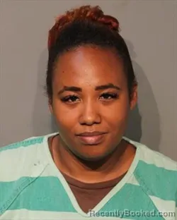 Mugshot of Veronica Michelle Muchiri booked in Polk County, Iowa on August 30, 2026