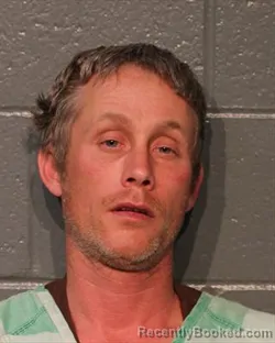 Mugshot of JASON WILLIAM HOLSINGER