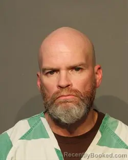 Mugshot of DUSTIN ALAN ARMSTRONG booked in Polk County, Iowa on May 14, 2026