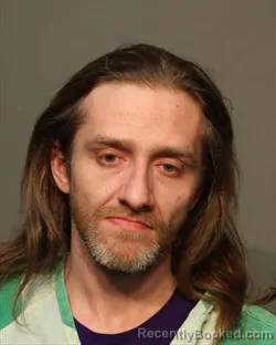 Mugshot of TREVOR WILLIAM SLAGLE booked in Polk County, Iowa on March 18, 2026