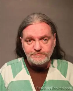 Mugshot of ETHAN GRANT CARLSON