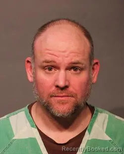 Mugshot of JUSTIN CHARLES NELSON