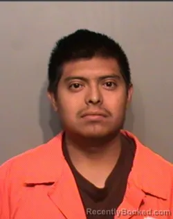 Mugshot of HUGO CESARIO LONGINES REYES booked in Polk County, Iowa on April 4, 2026