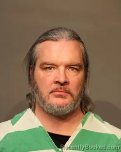 Mugshot of CRAIGE WHITMEN CAMERON booked in Polk County, Iowa on March 14, 2026