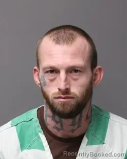 Mugshot of RICHARD CHARLES DAUGHENBAUGH