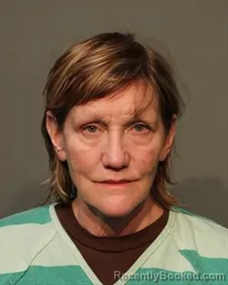 Mugshot of JENNY LORRAINE BAUER booked in Polk County, Iowa on March 10, 2026