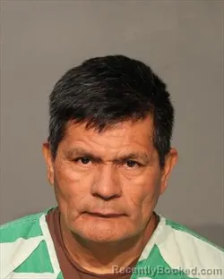 Mugshot of Reyes Manuel Escobar booked in Polk County, Iowa on August 26, 2026