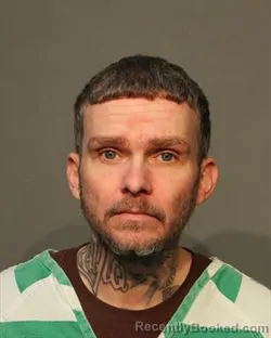 Mugshot of JASON ALLEN OWENS booked in Polk County, Iowa on March 11, 2026