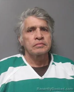 Mugshot of JUAN ENRIQUE DELAGARZA booked in Polk County, Iowa on March 18, 2026