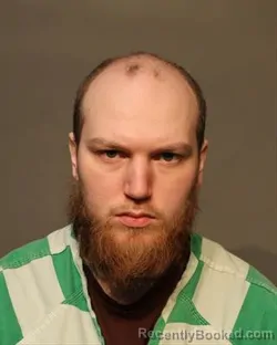 Mugshot of AARON THOMAS FRUIN booked in Polk County, Iowa on March 12, 2026