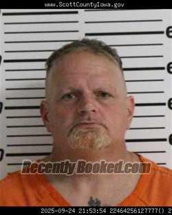 Booking photo from Scott County, Iowa
