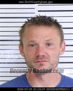 Mugshot of RYAN RICHARD RALFS booked in Scott County, Iowa on April 4, 2026