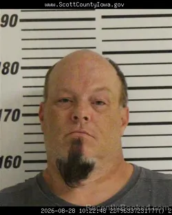 Mugshot of James Burton Dohrmann booked in Scott County, Iowa on August 28, 2026