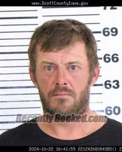 Booking photo from Scott County, Iowa