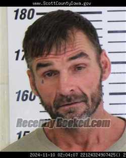 Booking photo from Scott County, Iowa
