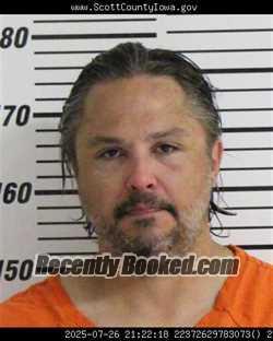 Mugshot of MICHAEL JOHN DUNBAR booked in Scott County, Iowa on April 15, 2026