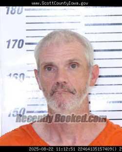 Mugshot of DENNIS JOHN WORKMAN booked in Scott County, Iowa on April 29, 2026