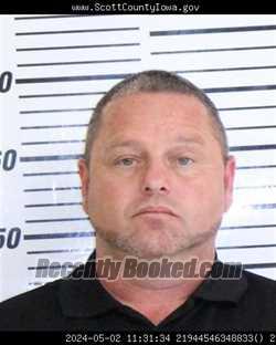 Booking photo from Scott County, Iowa