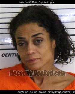 Mugshot of TIFFANY LYNN KIRK booked in Scott County, Iowa on March 29, 2026