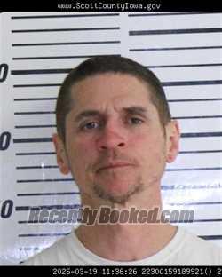 Mugshot of JOSHUA MICHAEL FEDRICK booked in Scott County, Iowa on May 7, 2026