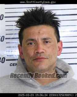 Booking photo from Scott County, Iowa