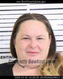 Mugshot of MICHELLE NICHOLE ROE booked in Scott County, Iowa on March 30, 2026